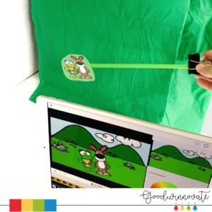 10 ideas for Mini Green Screens 8 puppet in front of green plastic table cloth for a mini green screen